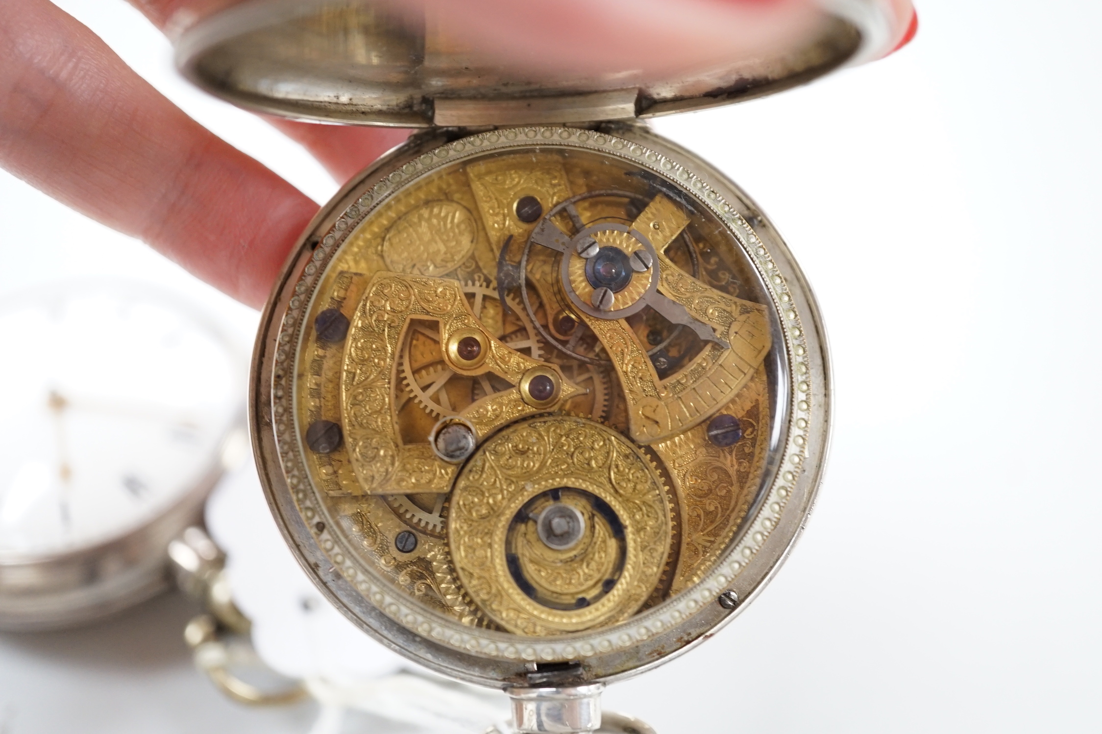 A 19th century silver pair cased keywind verge pocket watch by Haynes of London and one other Chinese? pocket watch.